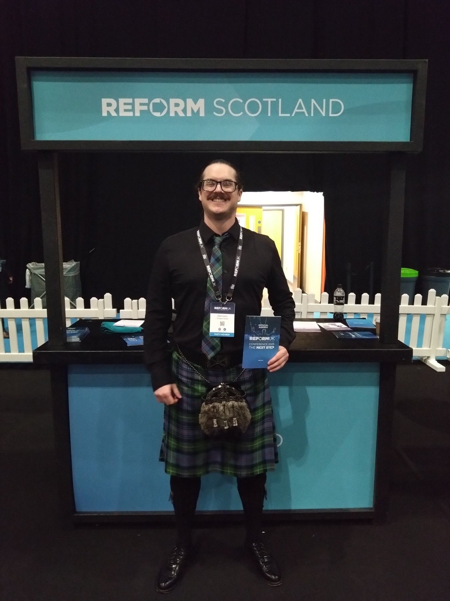 Allan Lyons wearing a Kilt at Reform stall